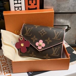 Iconic Brown Wallet with Deep Red Accents